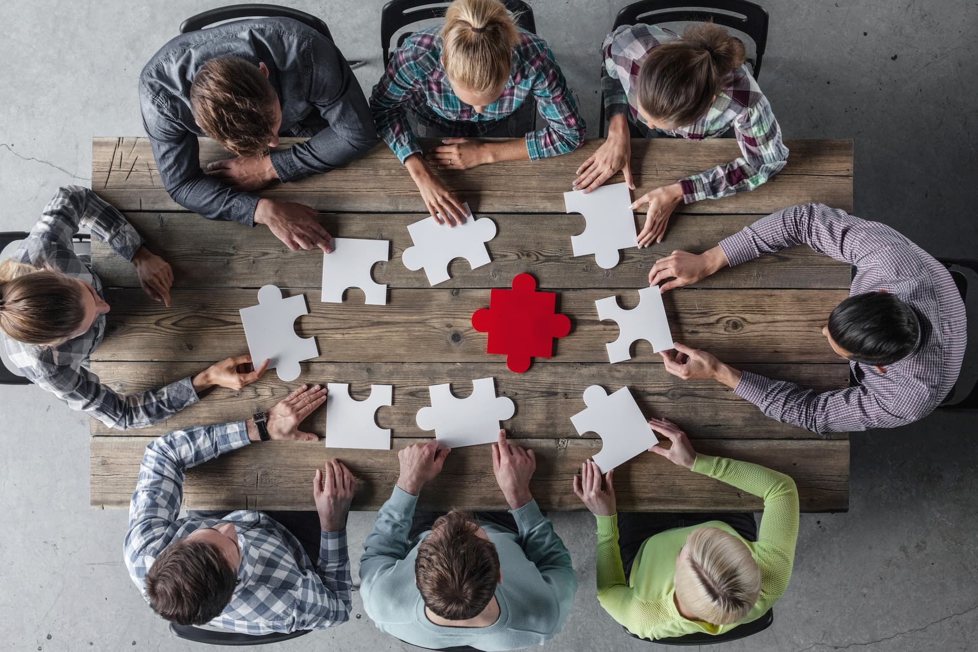 A diverse team collaborating around a table
