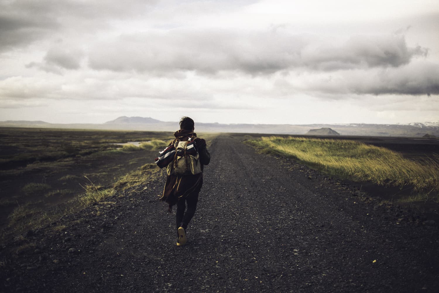 An adventurer looking out toward the horizon